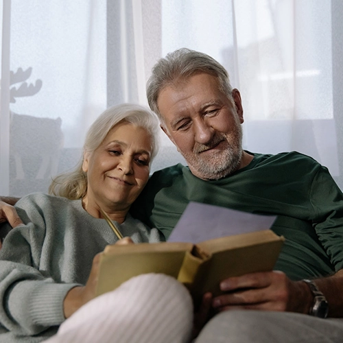 Middle Aged Couple Reading Books